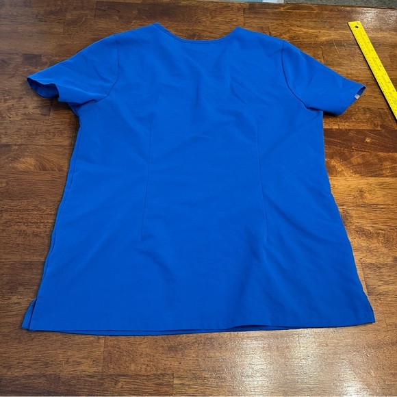 Figs Technical Collection Royal Blue Scrub Top size large PO# 2444 - Picture 7 of 8